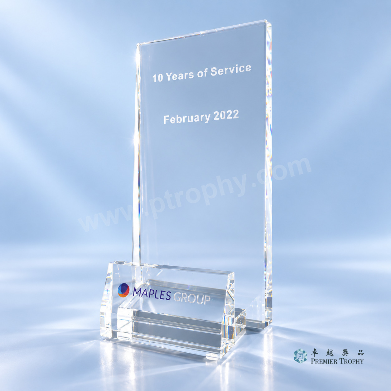 Crystal long service award on a matched base, engraved with the recipient tenure and date