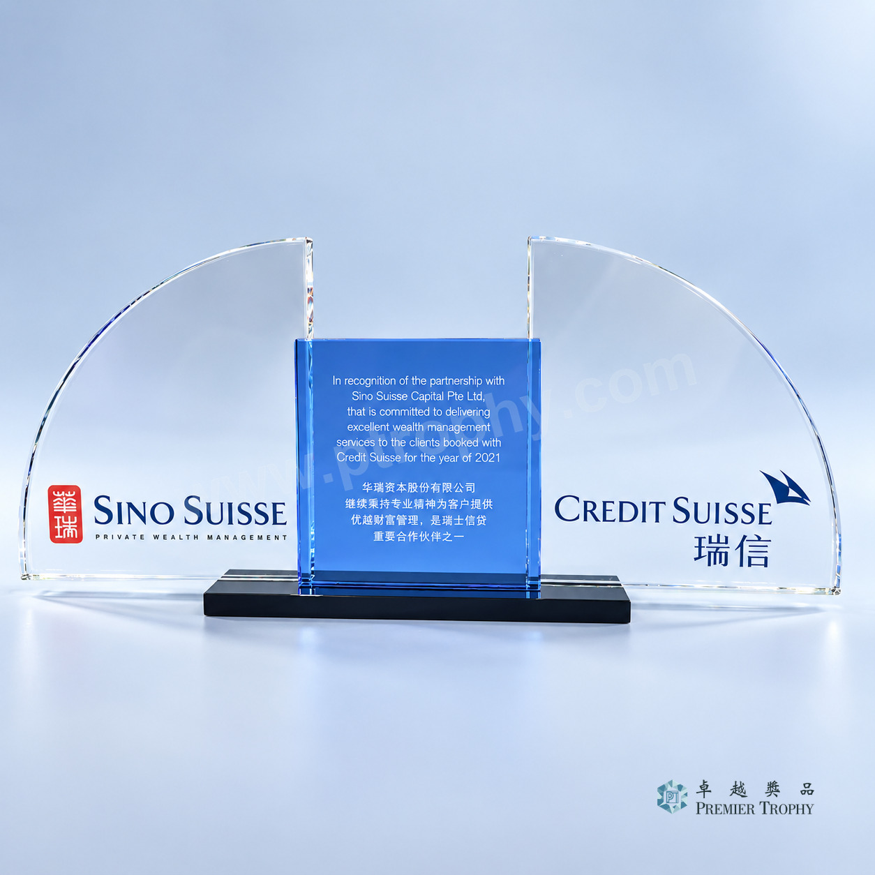 Two-party crystal tombstone engraved with the closing announcement of a private banking transaction